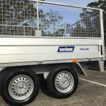 New trailer with cage for secure transportation, ideal for Sydney's heavy-duty hauling needs.
