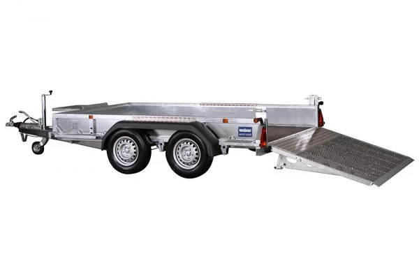 Beavertail flatbed trailer designed for easy loading and unloading of heavy equipment and vehicles.