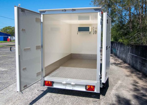 Variant freezer trailer in carpark -rear open view