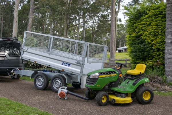 auto tilt trailer with trailer cage sides and ramps in NSW