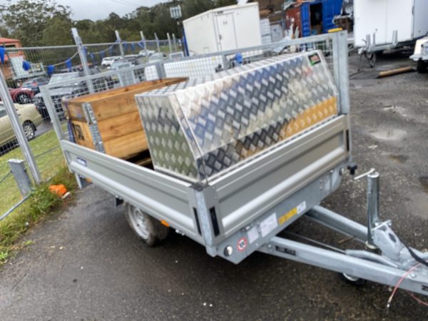 Trailer drawbar toolbox for organized tool storage.