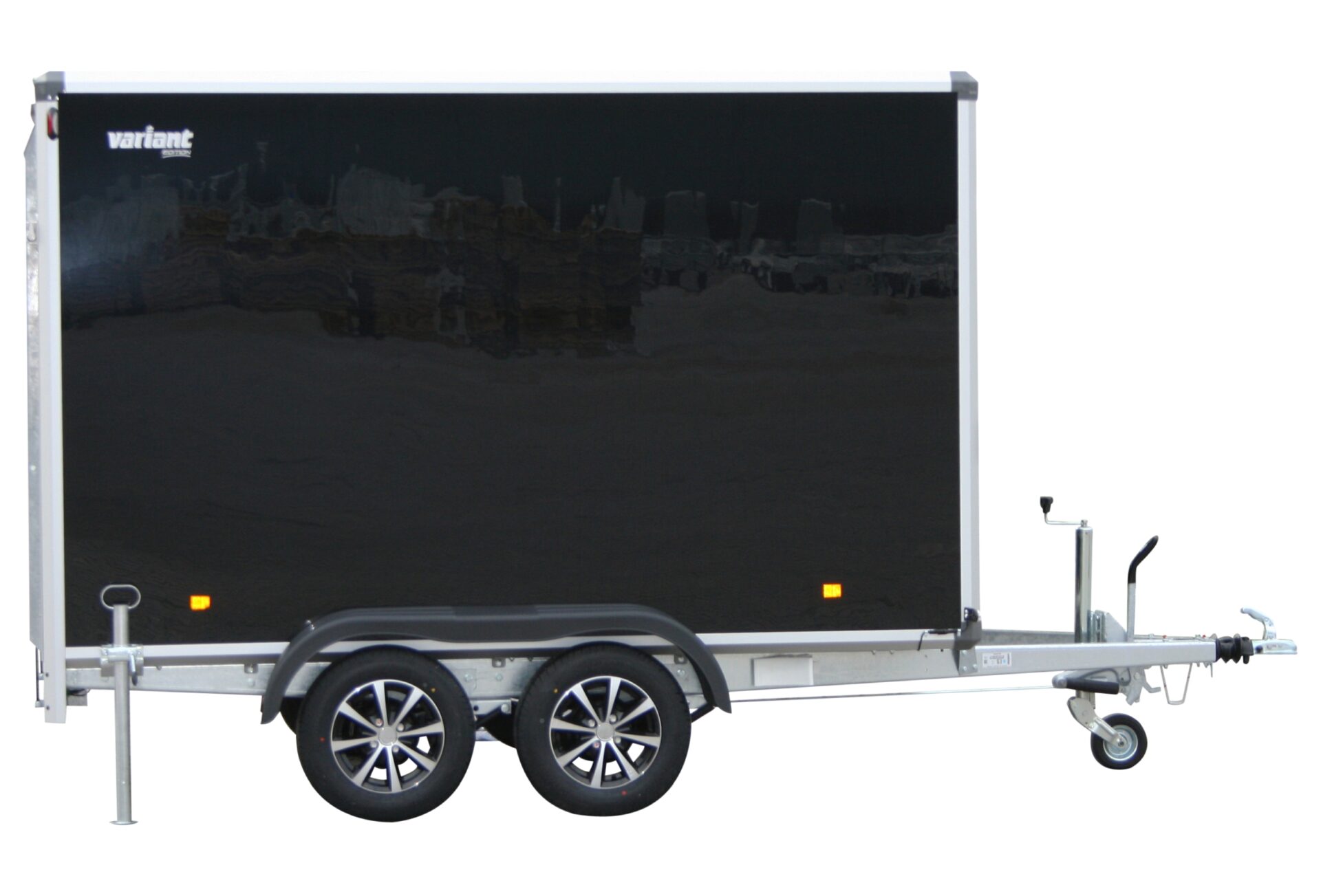 mag alloy wheels in black and silver, on cargo trailer for furniture